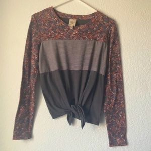 Long sleeve three pattern shirt with tie in the front. Self esteem size small.